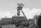 Black and white photograph of and old mining tower