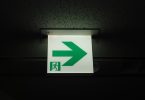 Emergency exit sign on a dark background