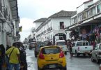 Cars in rainy Colombian street