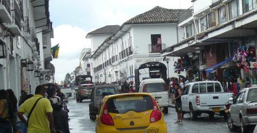 Cars in rainy Colombian street